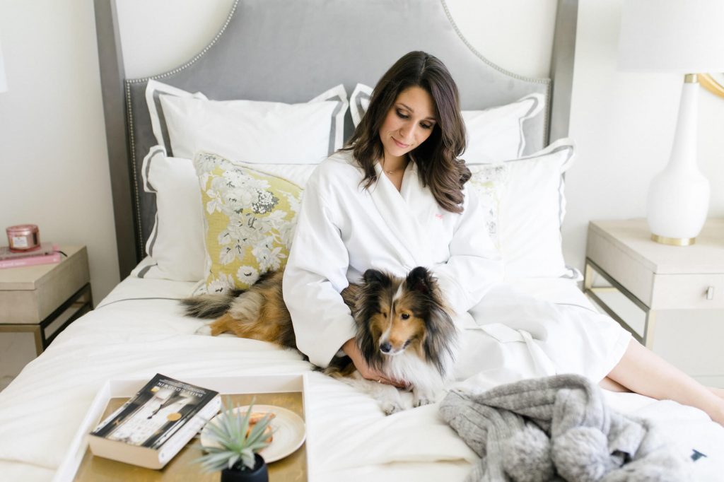 THEA lavish luxury lady relaxing with dog