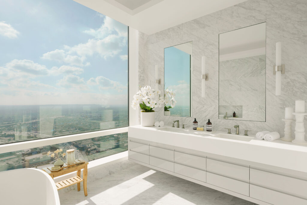 Bathroom with long white countertop with two sinks and two mirrors and quartz walls and flooring with floor-to-ceiling windows